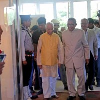 Dr. Prasanta Banerji accompanies HE inside the hall