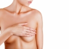 Болит спина после маммопластики: причины и методы борьбы